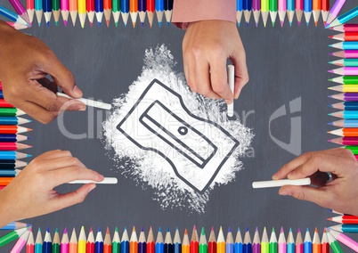 Hands writing equations on blackboard