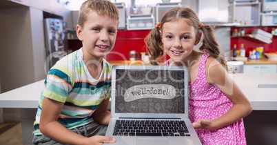 Kids looking at a computer with school icons on screen