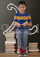 Student boy on a table reading against grey blackboard with school and education graphic