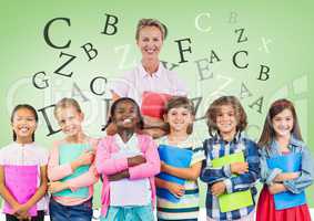Many letters around Kids holding schoolbooks with teacher in front of green background