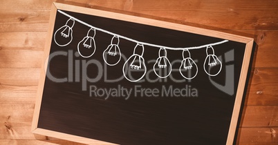 light bulbs on blackboard