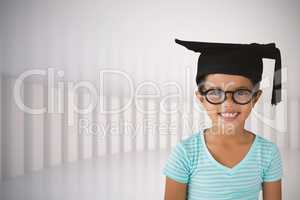 Composite image of portrait of cheerful girl wearing eyeglasses and mortarboard