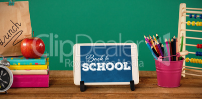 Composite image of back to school text over white background