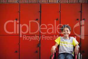 Composite image of cute disabled pupil smiling at camera in hall