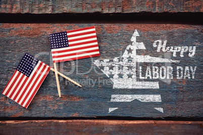 Composite image of composite image of happy labor day text and star shape american flag