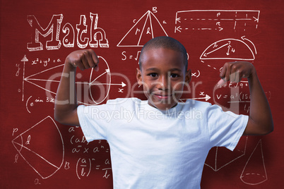 Composite image of portrait of boy flexing muscles