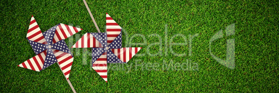 Composite image of 3d image composite of pinwheel with american flag pattern