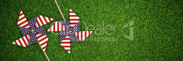 Composite image of 3d image composite of pinwheel with american flag pattern