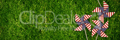 Composite image of 3d image of pinwheel toy with american flag pattern