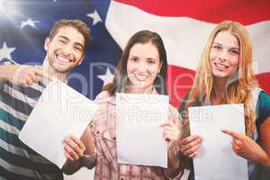 Composite image of smiling students showing their exams