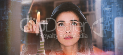 Composite image of young female hacker using digital screen
