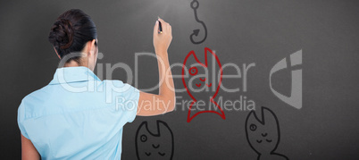 Composite image of concentrated businessman writing with marker