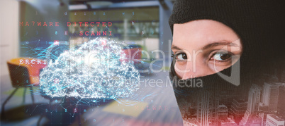 Composite image of portrait of female hacker wearing balaclava