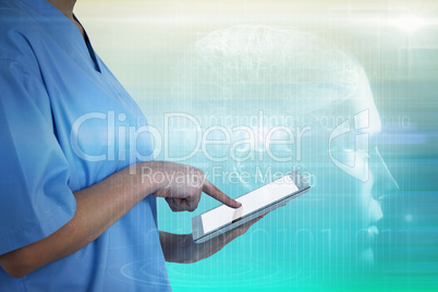 Composite image of midsection of female doctor using digital tablet