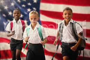 Composite image of students running against white background