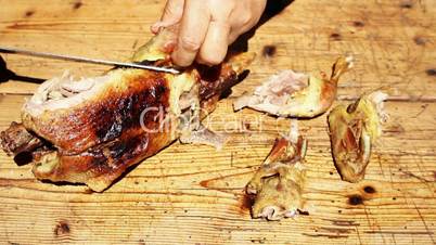 Roasted Duck Meat Being Chopped On Wooden Table