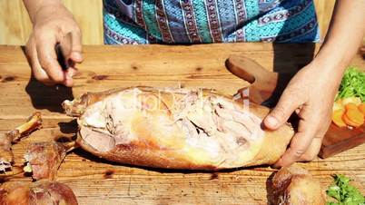 Roasted Goose Meat Being Chopped On Wooden Table