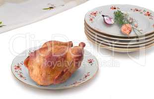 Fried chicken on a plate on a white background