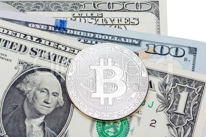 American dollars on white background covered with silver bitcoin
