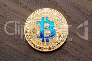 Red background with golden blue bitcoin.