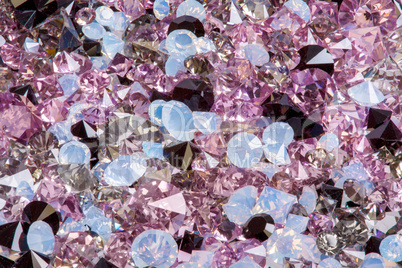 Many small diamond jewel stones, luxury background close-up