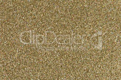 Gold glitter texture. Low contrast image.