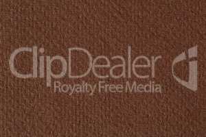 Closeup of abstract grunge brown paper background.