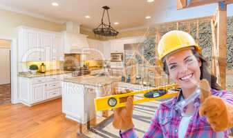 Female Construction Worker In Front of House Framing Gradating t