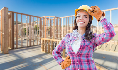 Young Attractive Female Construction Worker Wearing Gloves, Hard