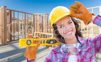 Female Construction Worker Holding Level Wearing Gloves, Hard Ha