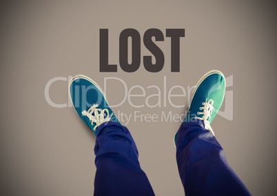 Lost text and Green shoes on feet with brown background