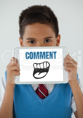 Comment text and cartoon mouth graphic on tablet screen with boy