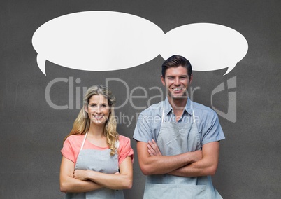 Small business owner couple with speech bubbles standing against grey background