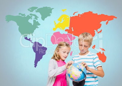 Kids turning world globe in front of colorful world map