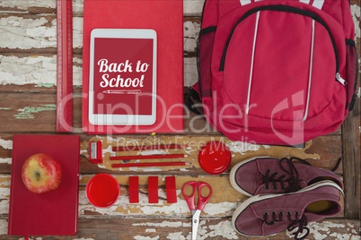 Tablet on a school table with back to school text on screen