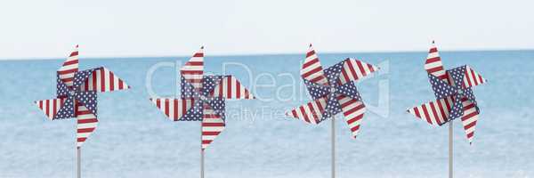 USA wind catchers in front of sea