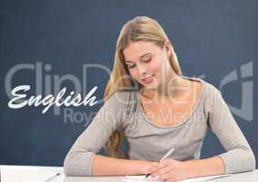Student girl at table against blue blackboard with English text