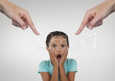 Hands pointing at surprised girl against white background