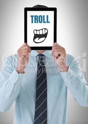 Troll text with cartoon mouth on tablet over mans face