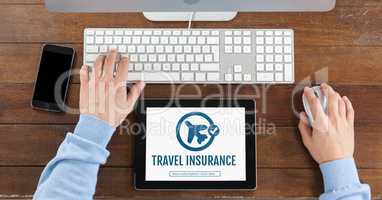 Tablet with travel insurance concept on screen