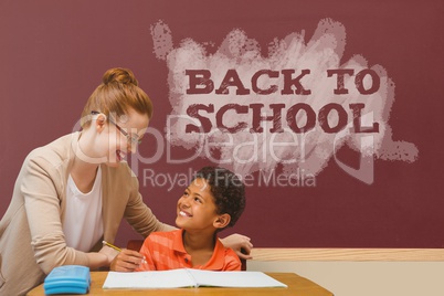 Student boy and teacher at table against red blackboard with back to school text