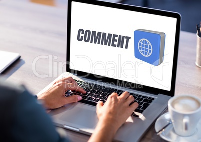 Comment text and world graphic on laptop screen with hands