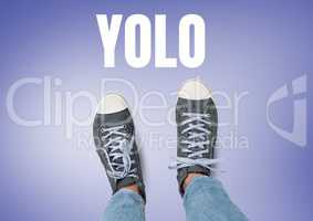 YOLO text and Grey shoes on feet with purple background