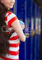 female student in front of lockers