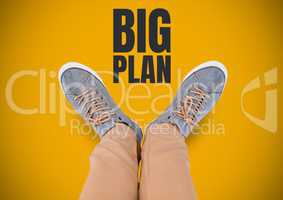 Big plan text and Grey shoes on feet with yellow background