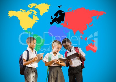 School kids looking at tablets in front of colorful world map