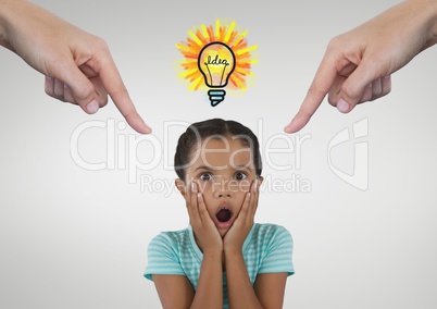 Hands pointing at surprised girl against white background with bulb icon