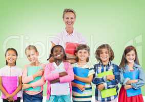 Kids holding schoolbooks with teacher in front of green background