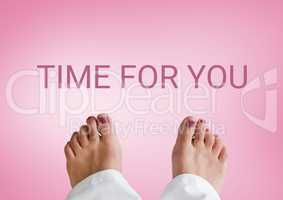Time for you text  and bare feet with pink background