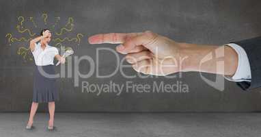 Hand pointing at surprised business woman against grey background with question marks